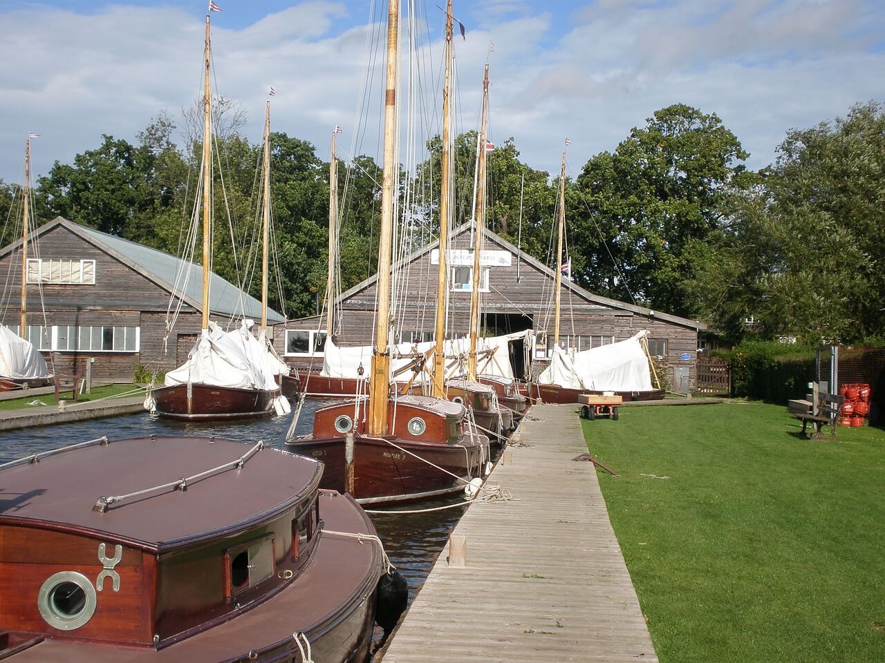 View of luxury boat hire on the Norfolk Broads. A spacious and stylish boat with comfortable seating and scenic views.