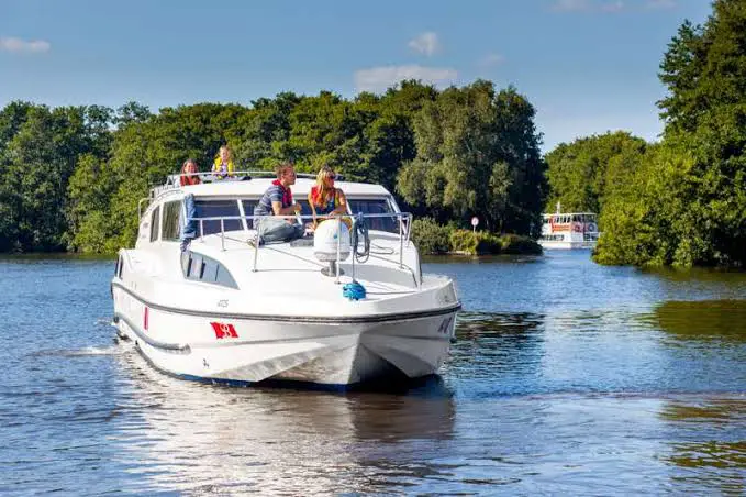"Image depicting cost and considerations when visiting Norfolk Broads at Wroxham. The picture highlights important aspects and expenses for travelers exploring this renowned destination within the Norfolk Broads."