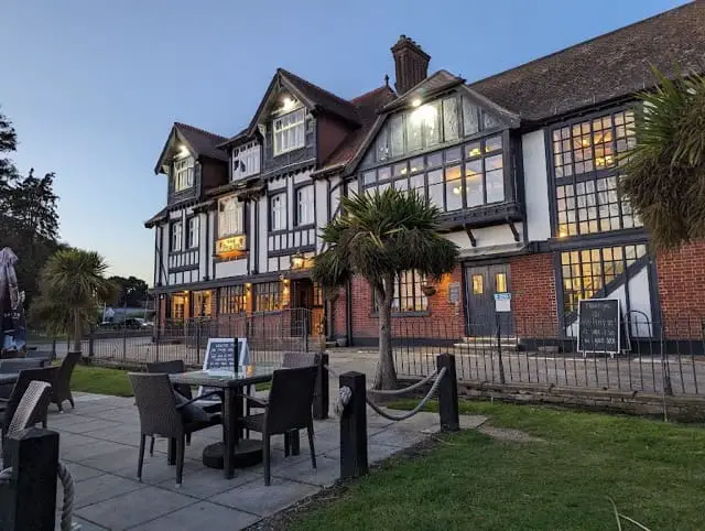 Image presenting the picturesque Swan Inn within the Norfolk Broads, accentuating the appeal of luxury boat hire in this charming locale. The inn's quaint charm adds to the allure of premium boating experiences amidst this renowned waterway."